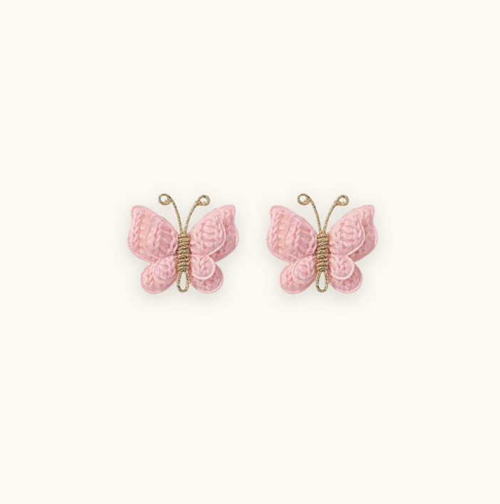 Pink butterfly crochet hair pins for baby girls, hand-made and perfect for adding a cute and stylish touch to any outfit. Great for baby hair accessories and children's fashion collections