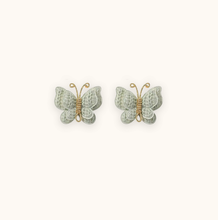 Luxury pastel green butterfly crochet hair pins for baby girls, meticulously hand-made to add a touch of elegance and style to any outfit. Perfect for high-end baby hair accessories and fashionable children's collections.