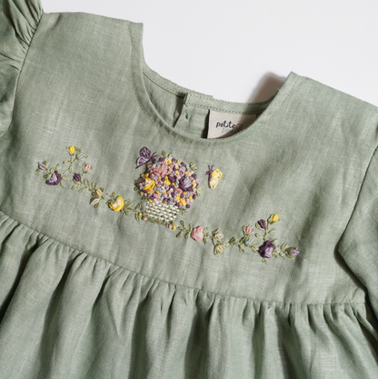 Baby girls' linen floral embroidered top, featuring hand-embroidered flowers, perfect for stylish and comfortable baby wear. Ideal for baby fashion and organic luxury clothing collections